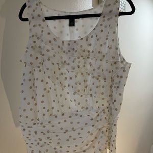 Beautiful sleeveless shell. Size XL. Ruffled front with ruching at bottom.